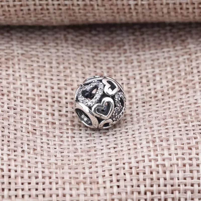 (afbeelding voor) PANDORA Openwork Hearts Silver Bedel With Fancy Pink Cubic Zirconia - 791424CZs - Bekijken 3